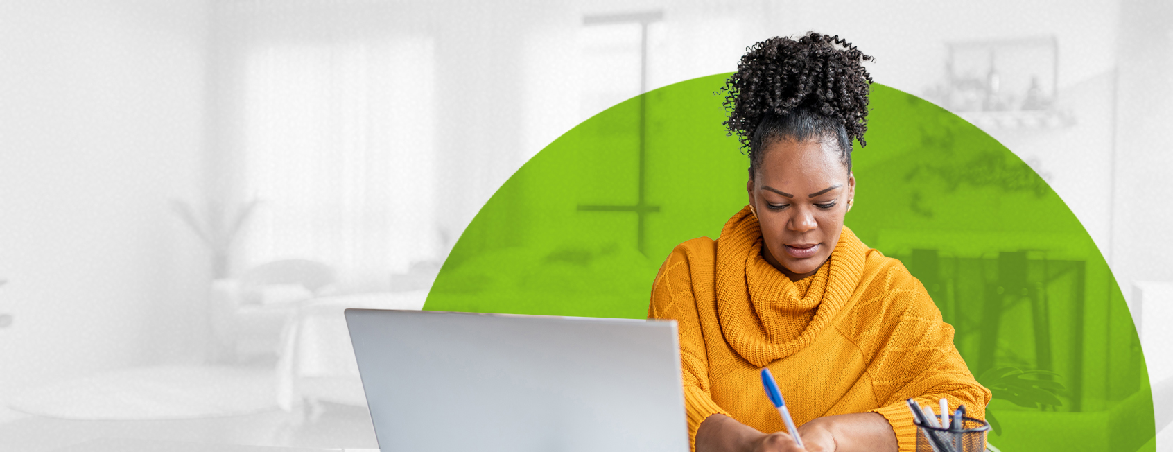Adult student studying on laptop at home.